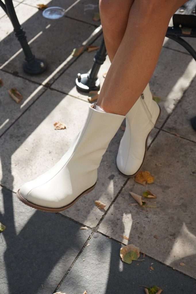 White Zamkova ankle boots: original model photograph